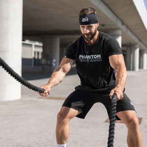 Headband Team von Phantom Athletics, entwickelt für Kampfsportler und Fitnessenthusiasten. Schützt vor Schweiß und sorgt für sicheren Halt bei dynamischen Bewegungen.