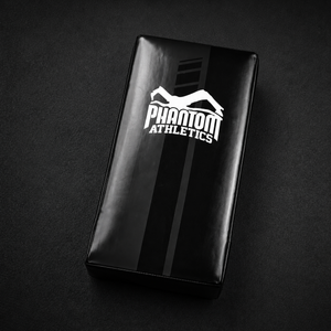 Das Phantom Athletics Kickpad Apex wurde für anspruchsvolles Kampfsport-Training entwickelt und bietet maximale Stabilität bei harten Kicks und Schlagkombinationen. Die robuste Verarbeitung und starke Polsterung machen das Schlagpolster ideal für MMA, Kickboxen, Muay Thai und intensives Sparring.