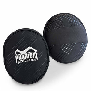 Hochwertige Phantom Athletics Focus Pads – ideal für präzises Schlag- und Kick-Training in MMA, Muay Thai oder Boxen. Die Polster bieten optimale Dämpfung und schützen Trainer und Athlet gleichermaßen.
