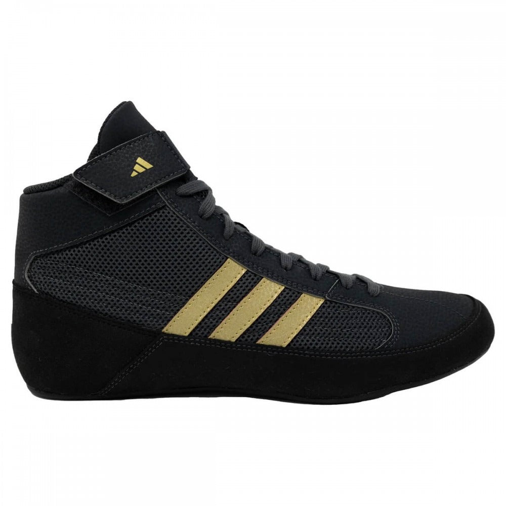 Die adidas Havoc Ringerschuhe in Schwarz-Gold überzeugen mit ihrem leichten Design und bieten optimalen Halt bei jeder Bewegung – ideal für ambitionierte Kampfsportler. Die griffige Außensohle sorgt für maximale Traktion auf der Matte.