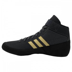 Hochwertige Verarbeitung trifft auf stylisches Design: Diese Ringerschuhe von adidas in Schwarz-Gold sind perfekt für intensive Trainingseinheiten im Ringen, MMA oder Grappling.