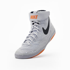 Hochwertige Nike Inflict SE Ring Shoes in Orange mit atmungsaktivem Mesh‑Obermaterial, entwickelt für schnelle Richtungswechsel und präzise Bewegungen auf der Matte.