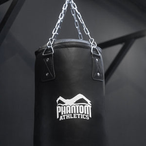 Gefüllter Muay Thai Boxsack mit stabiler Aufhängung, der jeden Kick und Schlag zuverlässig absorbiert. Für alle, die intensiv und nachhaltig Thaibox-Techniken wie Clinch-Knie und Low Kicks trainieren wollen.