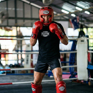 Das Phantom Athletics T-Shirt Mexico in Schwarz bringt authentischen Kampfsport-Style aus der mexikanischen Boxszene direkt in dein Training. Der markante Frontprint und die athletische Passform machen es ideal für MMA, Boxen und Kickboxen im Gym und Alltag.