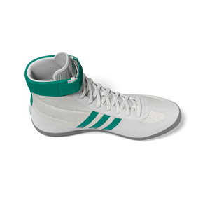 Moderne Wrestling-Schuhe von Adidas mit innovativer Sohlentechnologie für beste Bodenhaftung bei Kampfsportarten wie Jiu-Jitsu und Muay Thai.