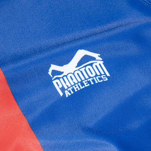 Mit dem Team Serbia Rashguard von Phantom Athletics setzt du ein Statement im Kampfsport. Der hochwertige Kompressionsstoff unterstützt deine Muskulatur und sorgt für ein trockenes Tragegefühl. Perfekt für intensives Training und Wettkämpfe.