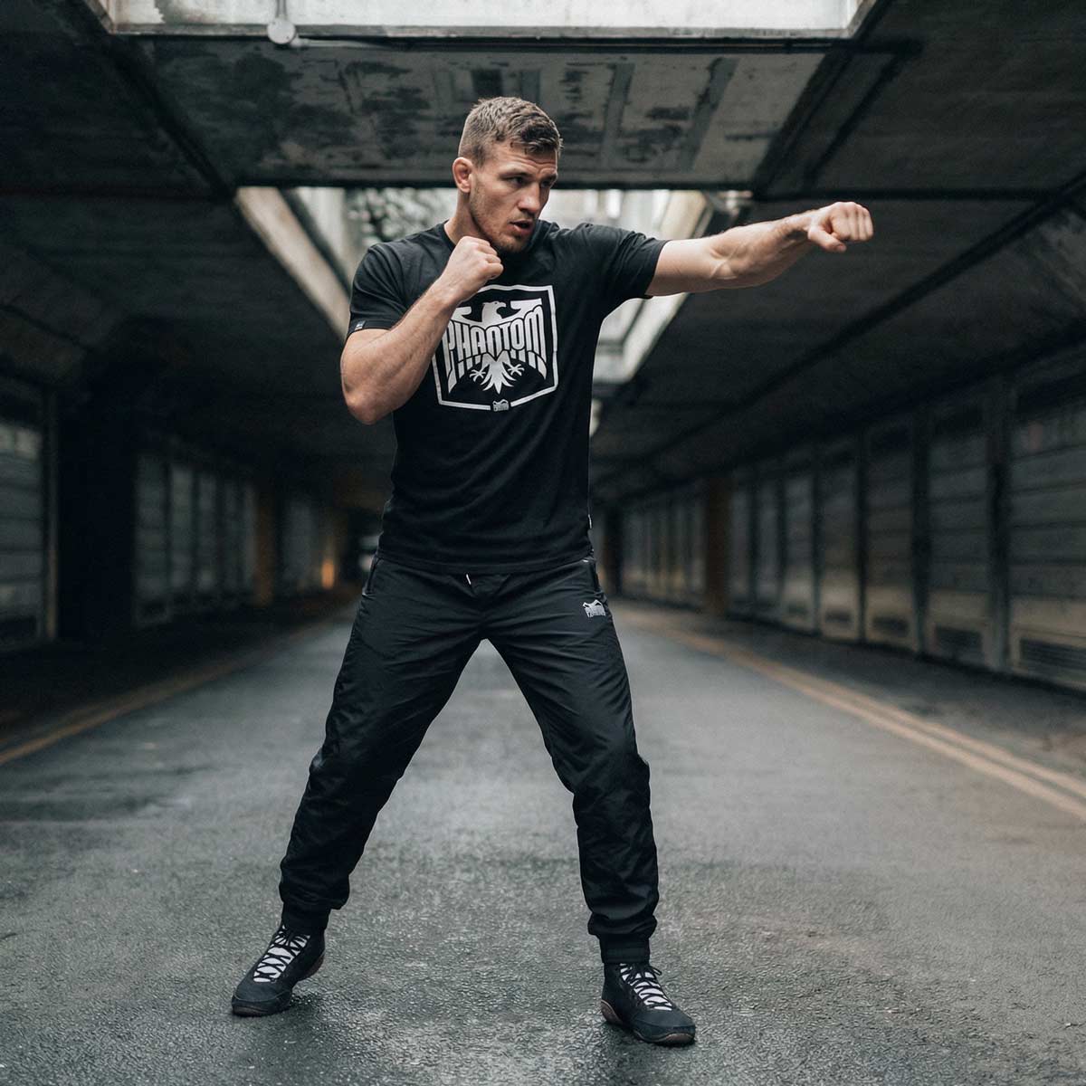 T-Shirt Germany NBD 25 Black von Phantom Athletics mit großem „Never Back Down“ Germany-Print, ideal für MMA-Training und intensive Sparring-Sessions.