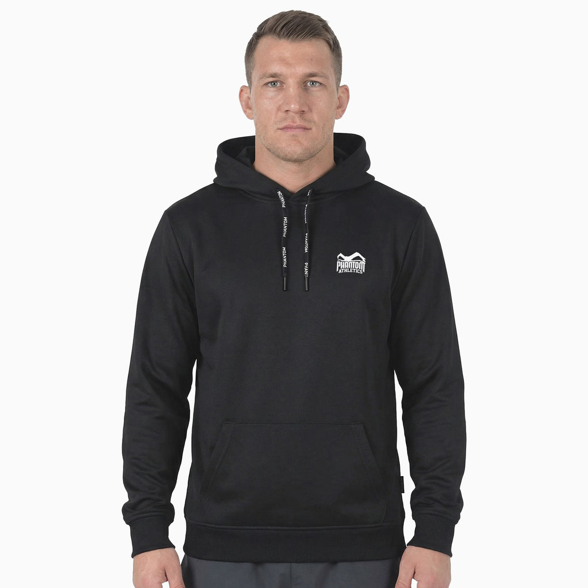 Funktionaler Phantom Athletics EVO Team Hoodie in Schwarz aus elastischem, atmungsaktivem Performance‑Material, ideal für intensives MMA‑Training, Warm‑ups und Fitness‑Workouts auf der Matte.
