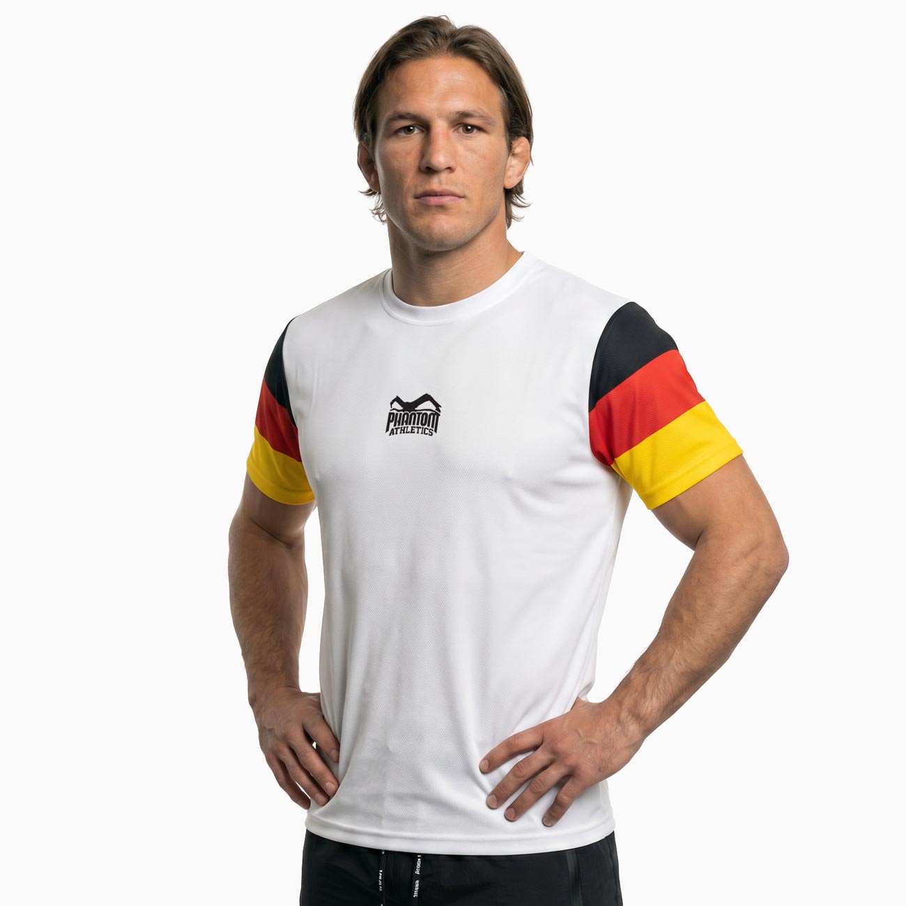Das Phantom Athletics Training Shirt EVO Team Germany White kombiniert funktionelle Performance mit sportlichem Kampfsport-Design für ambitionierte Athleten. Das atmungsaktive Material eignet sich ideal für MMA, Boxen, Kickboxen und Muay Thai und sorgt auch bei intensiven Trainingseinheiten für ein angenehm trockenes Tragegefühl.