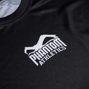 Das Phantom Athletics Training Shirt Evo Plus „Team“ ist die perfekte Wahl für Sportler, die Wert auf Performance und Design legen – geeignet für Boxen, Muay Thai und mehr.