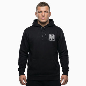 Funktioneller Kampfsport‑Hoodie von Phantom Athletics in Schwarz mit athletischem Schnitt und komfortabler Kängurutasche für den Weg zum Gym oder Outdoor‑Training.