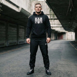 Robuster Hoodie Germany NBD Black von Phantom Athletics für Kampfsport-Athleten, der Komfort, Style und Bewegungsfreiheit verbindet.