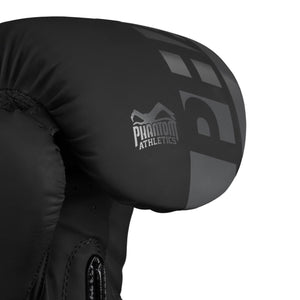APEX Boxhandschuhe Schwarz/Grau von Phantom Athletics – kompakte, sportliche Handschuhe mit hochwertigem Schaumstoff-Padding, ideal für Muay Thai, Mixed Martial Arts oder traditionelles Box-Training. Kombinieren Schutz, Komfort und langlebige Qualität.