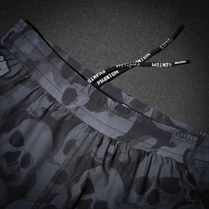 Hochwertige Phantom Athletics Fightshorts mit aggressivem Totenkopf-Tarnmuster. Ideal für intensive Trainingseinheiten und Kampfsportarten aller Art.