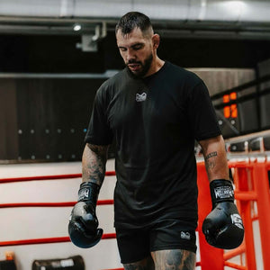 Phantom Athletics Oversize Shirt Team RAKIC – offizielle Team‑Ausrüstung, markantes Print‑Design auf Schwarz, hochwertiges Material und legerer Schnitt für Kampfsport‑Enthusiasten.