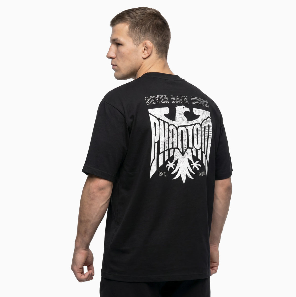 Das Phantom Athletics Heavy Tee Germany ist ein hochwertiges Kampfsport T-Shirt im oversized Fit mit markantem Germany Design. Der robuste Performance-Stoff eignet sich ideal für MMA, Boxen und intensives Training im Gym.