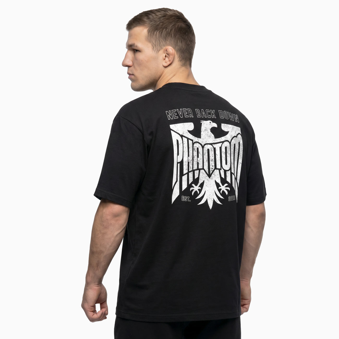 Das Phantom Athletics Heavy Tee Germany ist ein hochwertiges Kampfsport T-Shirt im oversized Fit mit markantem Germany Design. Der robuste Performance-Stoff eignet sich ideal für MMA, Boxen und intensives Training im Gym.