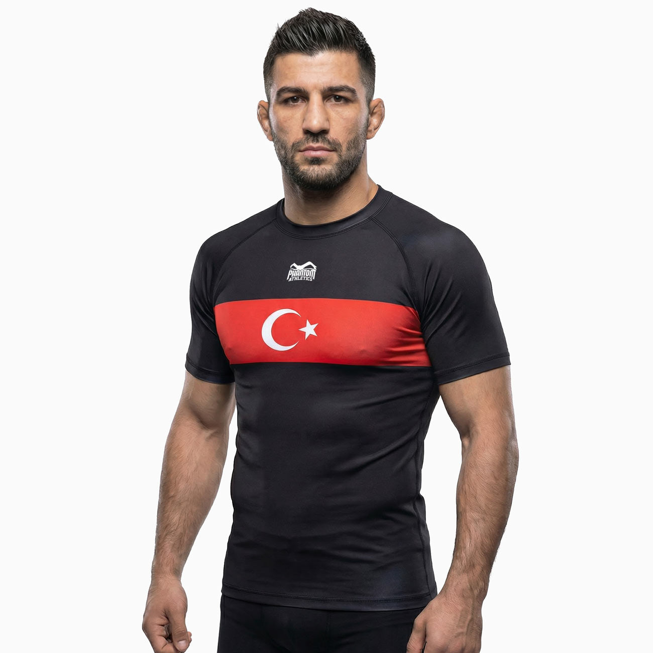 Phantom Athletics Rashguard Team Turkey Black für intensives Kampfsport‑ und MMA‑Training im Gym. Das enganliegende Compression‑Shirt unterstützt die Muskulatur und sorgt für optimale Bewegungsfreiheit beim Sparring und Grappling.