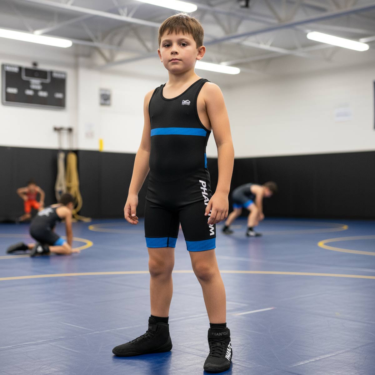 Phantom Athletics Kinder Ringerschuhe COMBAT in Schwarz – speziell entwickelter Kampfsportschuh für jungen Athleten mit sicherem Halt und Flexibilität.