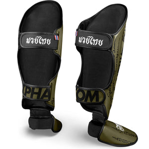 Phantom Athletics Shinpads in Army-Optik für Sparring und Techniktraining im Thaiboxen und Mixed Martial Arts. Hochwertige Polsterung schützt zuverlässig bei harten Kicks und Blocks.
