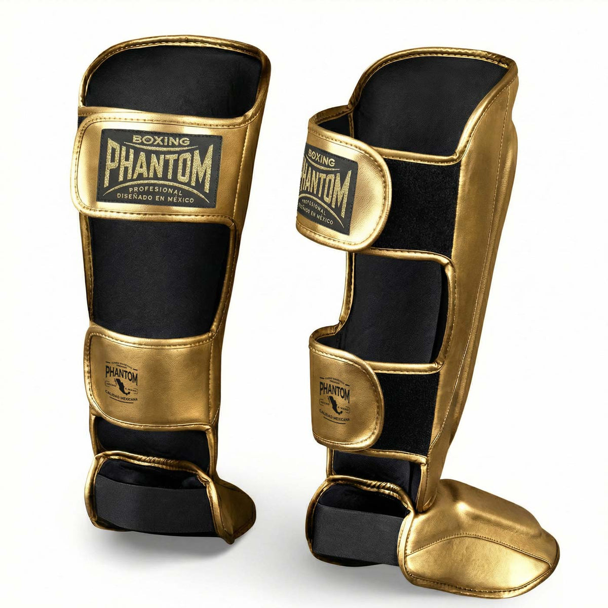 Premium Kampfsport Schienbeinschoner von Phantom Athletics in glänzendem Gold, entwickelt für harte Trainingseinheiten und volle Bewegungsfreiheit bei Kicks und Blocks im Gym. Durch ergonomische Passform und stabile Klettverschlüsse bietet er sicheren Halt und zuverlässigen Schutz bei Muay Thai, Kickboxen und MMA‑Sparring.