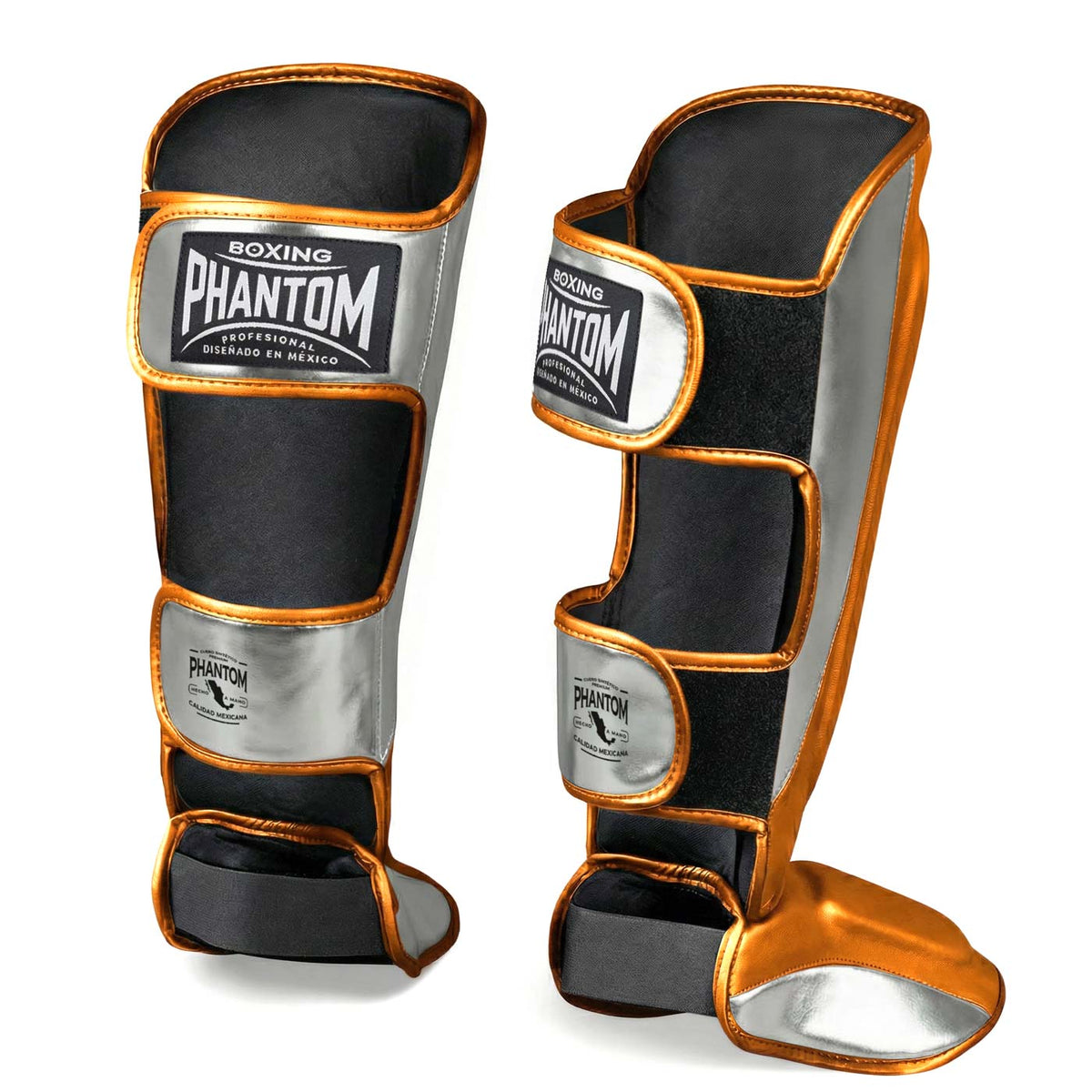 Premium Kampfsport Schienbeinschützer von Phantom Athletics in leuchtendem Orange und Silber, entwickelt für harte Trainingseinheiten und Technikworkouts im MMA oder Kickboxen. Die ergonomische Passform und sicheren Klettverschlüsse sorgen für stabilen Halt, Schutz und Komfort bei jedem Training.