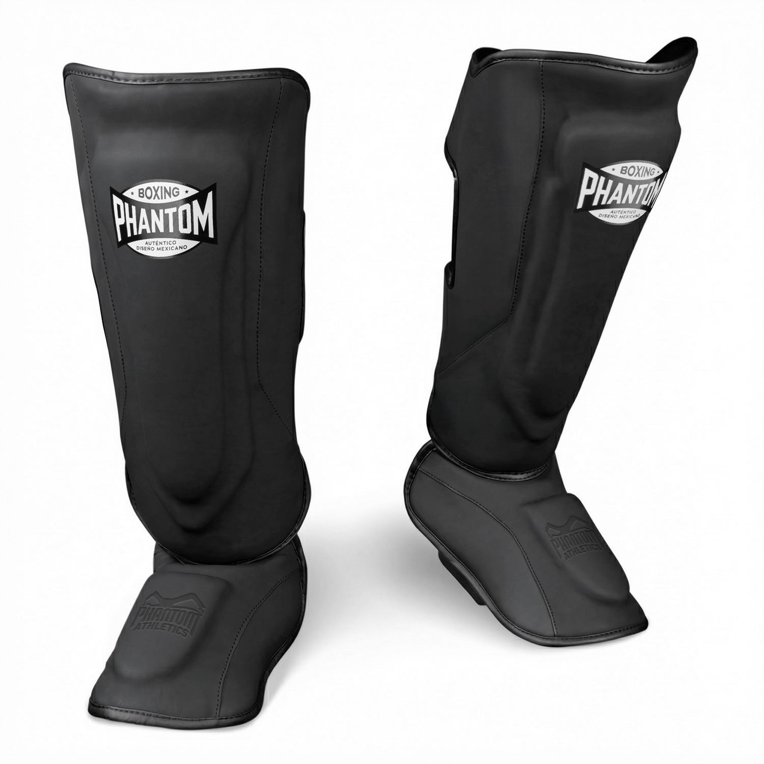 Hochwertige Phantom Athletics Shinpads MEXICO in Schwarz, perfekt für intensives Kampfsport‑Training im Muay Thai, Kickboxen und MMA mit zuverlässigem Schutz bei harten Kicks und Sparring. Die robuste Polsterung und ergonomische Passform sorgen für hohen Komfort und Stabilität im Gym und bei Technik‑Workouts.