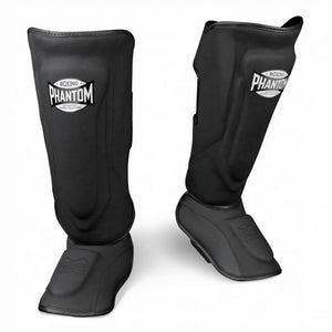 Hochwertige Phantom Athletics Shinpads MEXICO in Schwarz, perfekt für intensives Kampfsport‑Training im Muay Thai, Kickboxen und MMA mit zuverlässigem Schutz bei harten Kicks und Sparring. Die robuste Polsterung und ergonomische Passform sorgen für hohen Komfort und Stabilität im Gym und bei Technik‑Workouts.