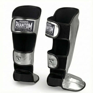 Robuste Kampfsport Schienbeinschützer von Phantom Athletics im markanten Mexico-Design für harte Trainingseinheiten im Gym. Die ergonomische Passform und stabilen Klettverschlüsse sorgen für sicheren Halt und Komfort beim Kickboxen, MMA oder Muay Thai Sparring.