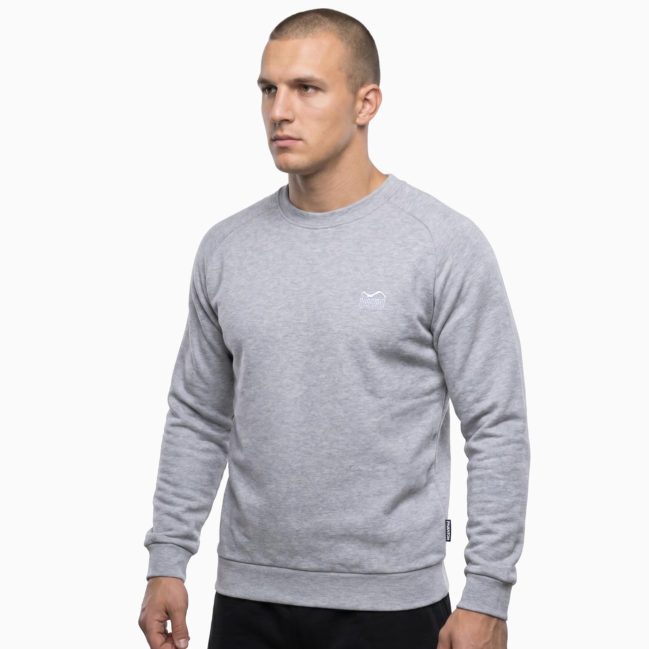 Der Phantom Athletics Sweater Unit Gray bietet sportlichen Komfort und ein cleanes Design für Kampfsportler im Alltag und Training. Das weiche, hochwertige Material sorgt für angenehme Wärme beim Warm-up, im Gym oder auf dem Weg zum Training und eignet sich ideal für MMA, Boxen und Fitness.