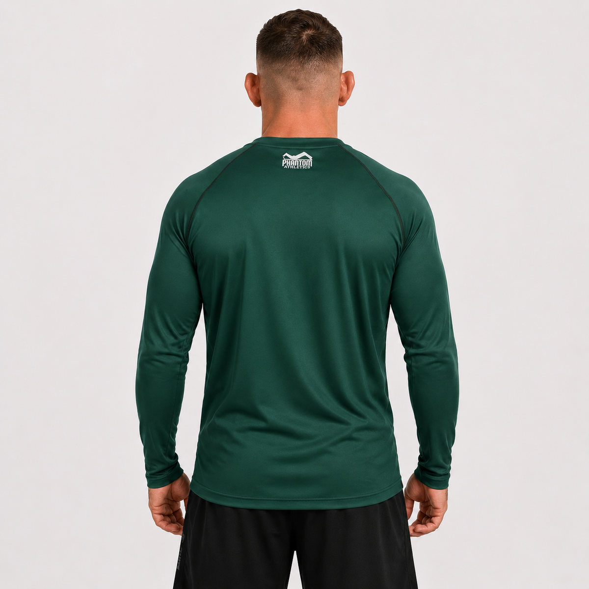 Dieses hochwertige Phantom Athletics Longsleeve Trainingsshirt wurde für Athleten entwickelt, die Schutz, Beweglichkeit und Atmungsaktivität kombinieren möchten. Perfekt für Sparring, Grappling, Fitness-Workouts und funktionelles Training unter wechselnden Trainingsbedingungen.