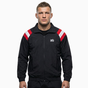 Hochwertige Phantom Athletics Trainingsjacke DMC Team Austria in klassischem Schwarz‑Rot‑Weiß, ideal für MMA‑Training, Warm‑ups und Fitness‑Sessions auf der Matte.