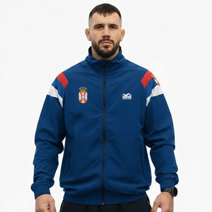 Premium Marke Phantom Athletics Track Jacket „DMC Team Serbia“ in Blau – funktionale Trainingsjacke im Retro‑Look, ideal für MMA, Boxen oder Fitness‑Training.