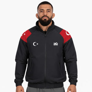 Hochwertige Trainingsjacke Track Jacket DMC Team Turkey von Phantom Athletics – sportlicher Retro‑Look mit schwarz‑roten Akzenten, ideal für MMA, Boxen und Kampfsport‑Training.
