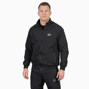 Funktioneller Kampfsport‑Tracksuit von Phantom Athletics in Schwarz mit atmungsaktivem Material für Boxen, Kickboxen und Sparring‑Workouts.