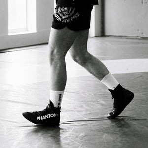 Phantom Athletics Combat Wrestling-Schuhe in Schwarz kombinieren stylisches Design mit hoher Funktionalität für Training und Wettkampf.