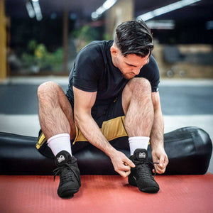 Phantom Tactic Ringerschuhe mit sicherem Sitz durch Schnürung und Klettverschluss. Die flexible Sohle gewährleistet Bewegungsfreiheit und sicheren Halt auf der Matte.