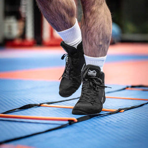 Leichte und strapazierfähige Phantom Tactic Ringerschuhe mit sicherem Sitz. Entwickelt für ambitionierte Athleten, die Stabilität und Komfort auf der Matte suchen.