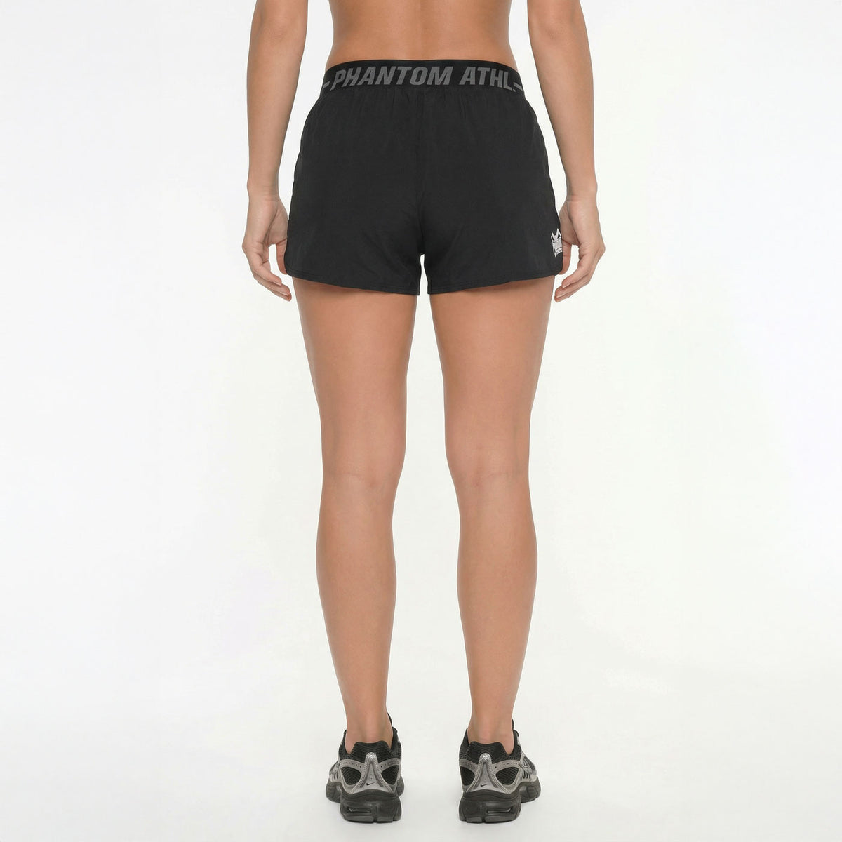 Sportliche Trainings‑Shorts von Phantom Athletics mit elastischem Hüftband und versteckter Tasche, perfekt für Gym‑Sessions und Sparring.