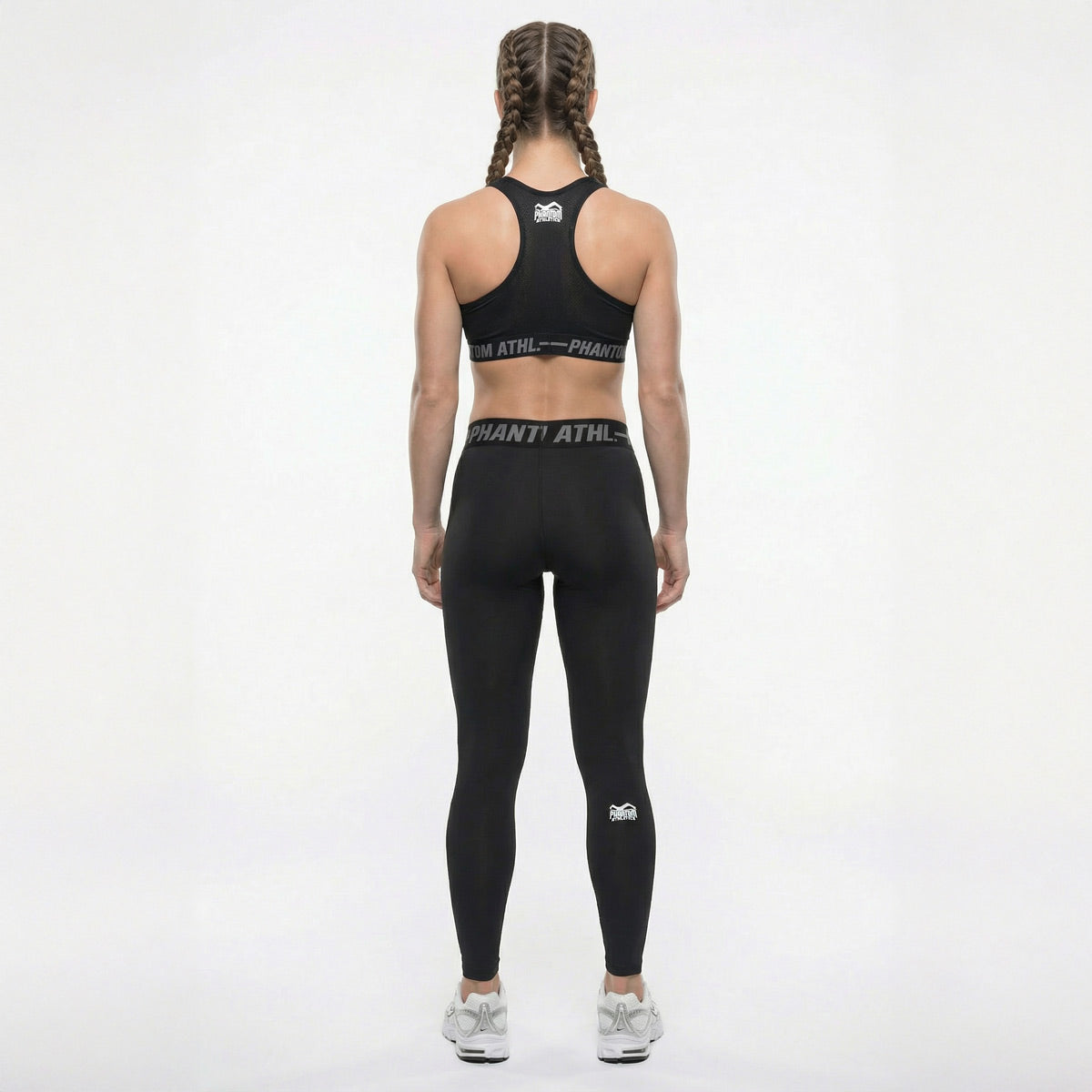 Sportliche Phantom Athletics Eclipse Leggings mit hoher Taille für Komfort und Support bei Fitness‑ und Konditions‑Einheiten.