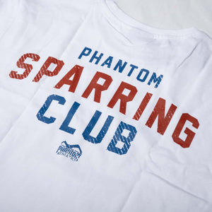 Das Phantom Athletics SPARRING CLUB Oversize T-Shirt in Weiß überzeugt mit einem sportlichen Retro-Look und kontrastreichem Rückenprint. Die hochwertige Fightwear bietet angenehmen Tragekomfort beim Warm-up, auf dem Weg ins Gym und nach intensiven Kampfsporteinheiten.