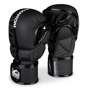 Die Phantom Athletics MMA Sparring Handschuhe APEX bestehen aus robustem veganem PU und sind für intensive Trainingseinheiten konzipiert. Mit etwa 6 bis 7 Oz bieten sie eine Kombination aus Schutz und Beweglichkeit für MMA, Grappling, Clinch und Sparring.