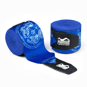 Die blauen Phantom Athletics Sak Yant Boxing Handwraps vereinen Schutz und Stil mit ihrem traditionellen Sak Yant Muster und extra langen 400 cm Bandagen. Sie bieten stabilen Halt und optimale Polsterung für Handgelenke und Knöchel und eignen sich perfekt für intensives Training im Boxen, Muay Thai und anderen Kampfsportarten.