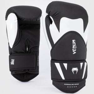 Mit hochwertigem PU-Kunstleder und mehrschichtiger Schaumstoffpolsterung bieten die Venum Challenger 4.0 Boxhandschuhe exzellente Schlagabsorption. Perfekt für Techniktraining, Sparring und Wettkämpfe im Boxen, Kickboxen und Muay Thai.