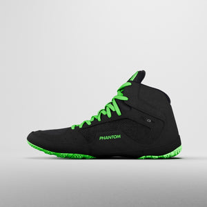Tactic Ringerschuhe in Schwarz und Neon-Grün, die perfekte Kombination aus Leichtigkeit und Halt. Diese Phantom Athletics Schuhe bieten ausgezeichnete Stabilität auf der Matte und sehen dabei stylisch aus.