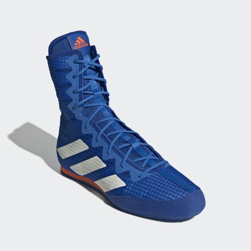 Adidas Box Hog 4 – Dynamisches Design in Blau/Silber für Boxer, die Leistung und Stil kombinieren wollen. Entwickelt für maximale Agilität und Halt im Wettkampf.