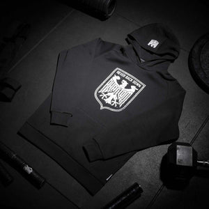 Robuster Trainings‑Hoodie Phantom Athletics Germany Schwarz/Weiß mit athletischer Passform und sportlichem Statement‑Design.