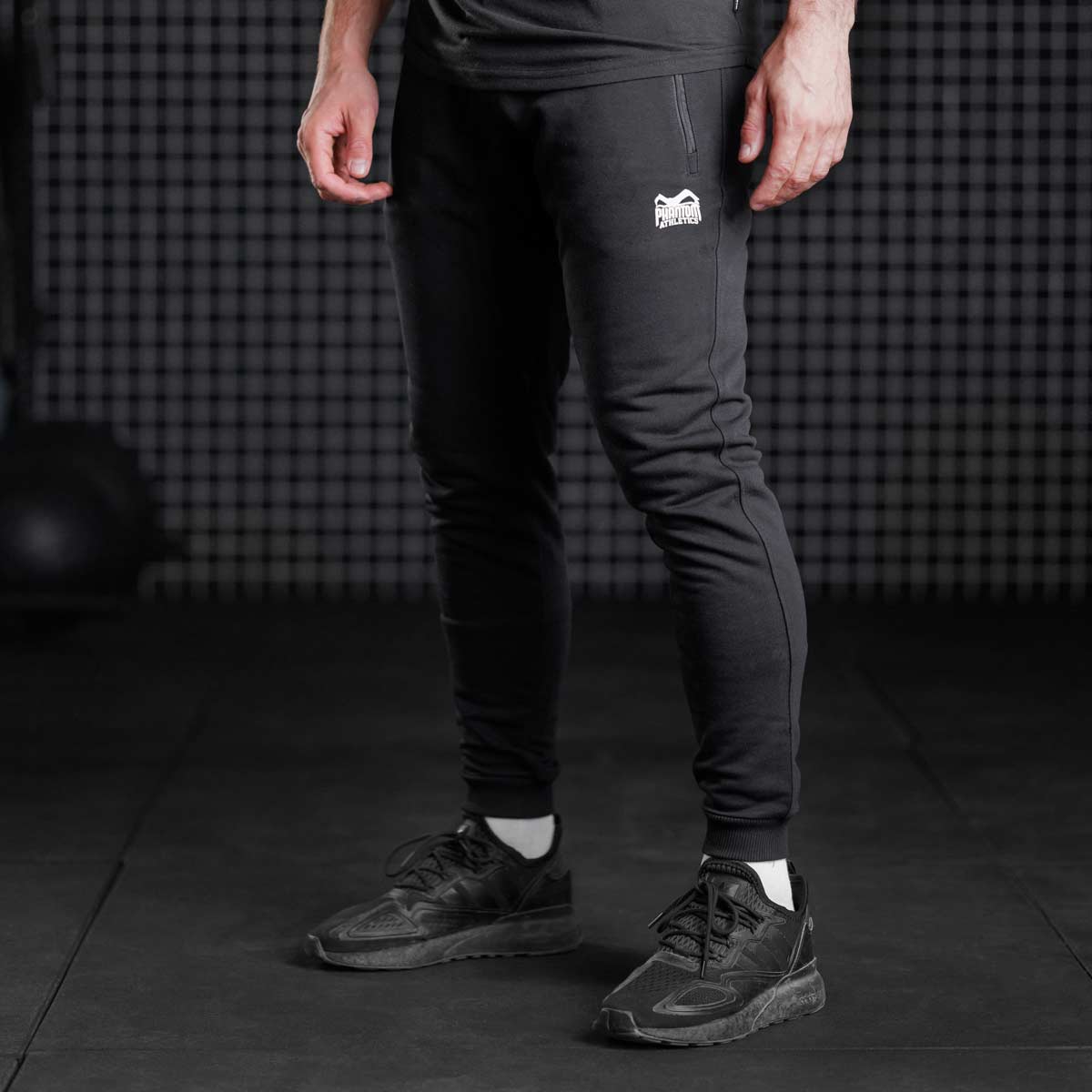 Phantom Athletics Radar Hose für Kampfsport und Fitness, gefertigt aus 50 % Baumwolle und 50 % Polyester. Der Athletic Fit endet knapp über dem Knöchel und bietet maximale Flexibilität.