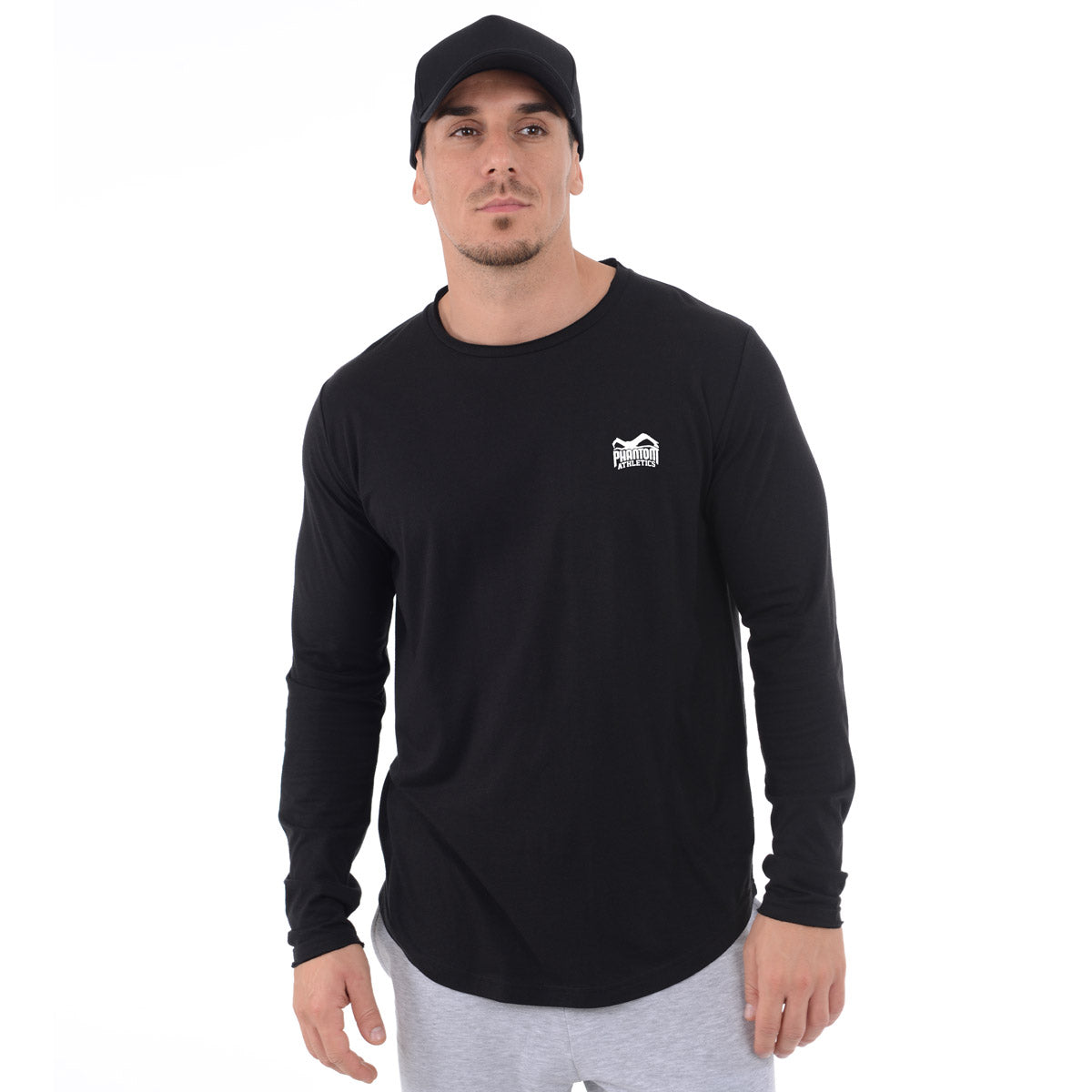 Dieses hochwertige Langarm Trainingsshirt von Phantom Athletics überzeugt durch seinen lockeren Athletic Fit mit offenen Ärmeln und Kragen für maximale Bewegungsfreiheit. Ideal für Muay Thai, Grappling und Fitness, bietet es eine perfekte Mischung aus Komfort und Performance.