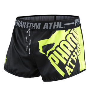 Phantom Athletics Fight Shorts Revolution Black Neon, perfekt für intensives Kampfsporttraining. Diese hochwertigen Shorts bieten außergewöhnlichen Komfort, Strapazierfähigkeit und ein modernes Design für MMA und Grappling.